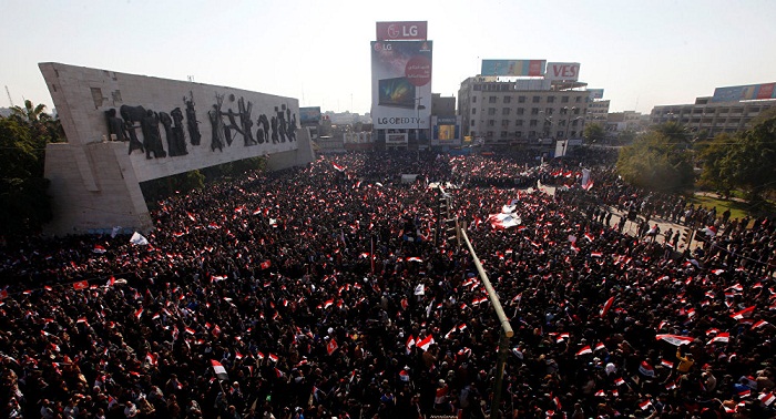 Clashes between police, protesters in Iraqi capital turn deadly